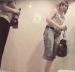 Two women are seen entering a public restroom and then peeing while speaking to each other in this voyeur-type video. One of the women is clearly visible, while the less attractive one is not.